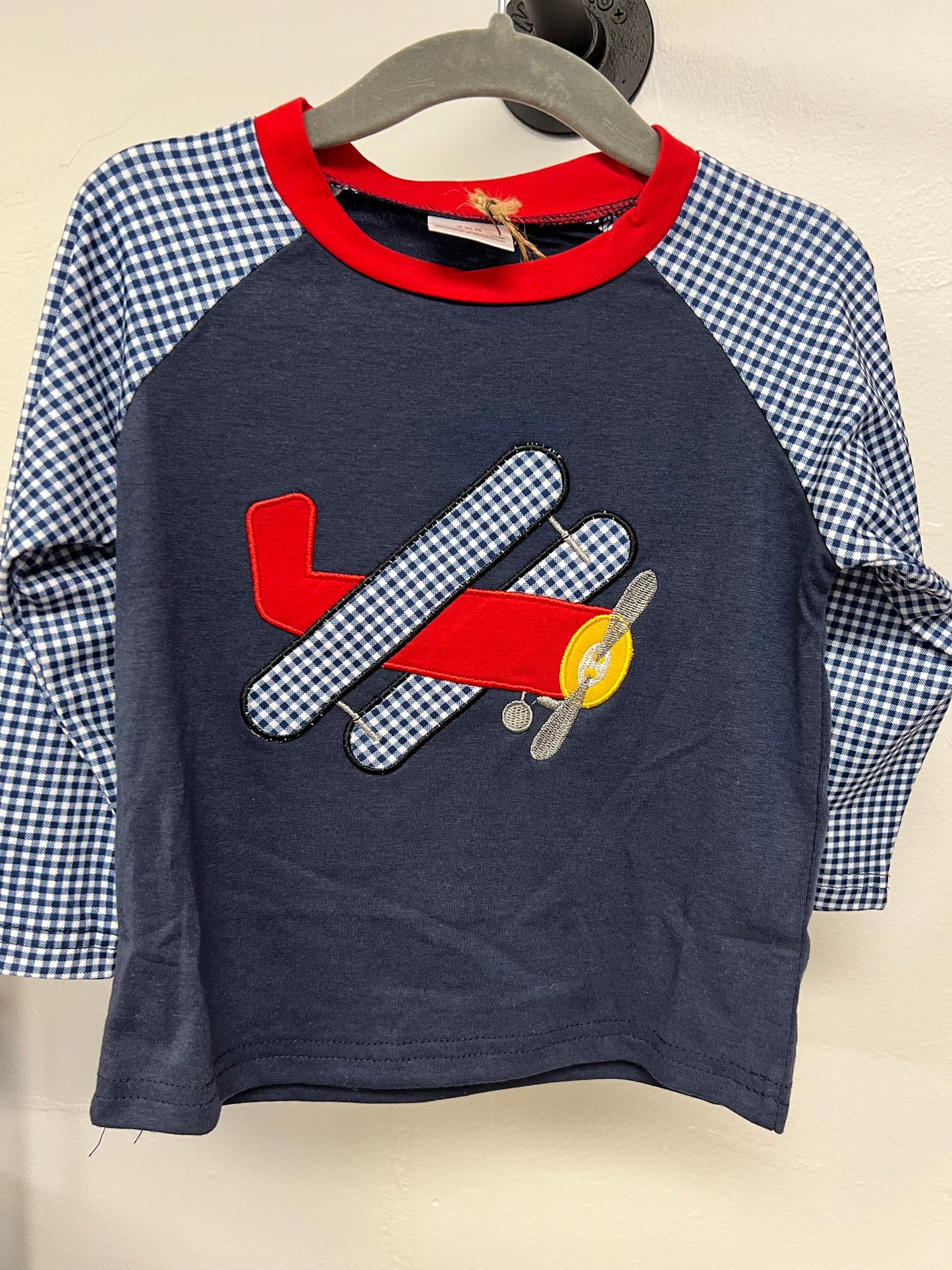 Boys Blue shirt with airplane appliqué